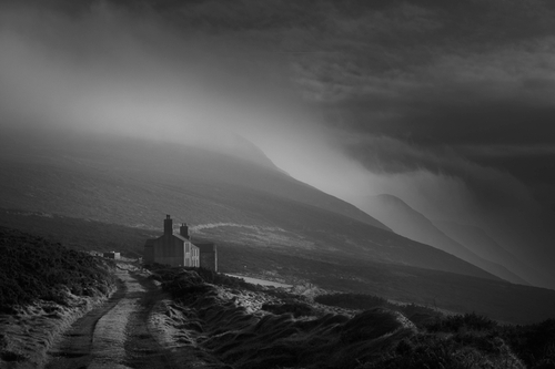 The sun breaks through on a winter's afternoon at Eary Cushlin. In the backdrop the low cloud that's been covering th…