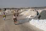 Senegal Lac Rose salt production 10 women walking along road