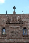 Santiago Apóstol, upper façade relief & roof cross