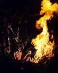 Tribesman with Father's skull - Papua New Guinea
