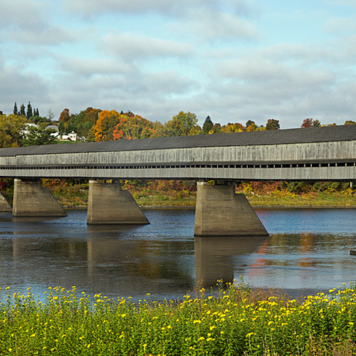 The Hartland Covered Bridge was officially opened in 1901 and spans the St. John river at a length of 391 metres (1,2…