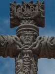 Façade roof cross, head & face of Christ