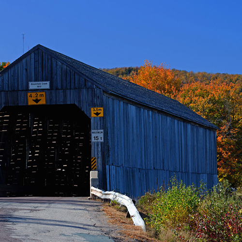 The Bloomfield Covered Bridge crosses the Kennebecasis River in rural Kings County, New Brunswick, Canada.