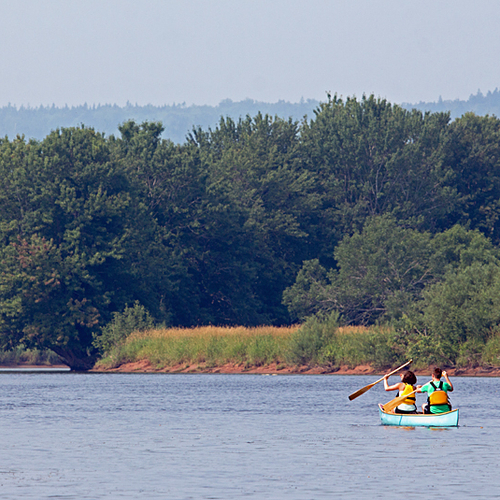 A canoe glides along the Kennebecasis near Hampton, New Brunswick.