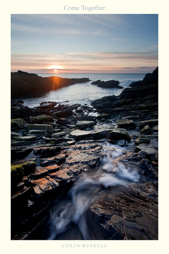 Night turns to day as fresh water meets the sea. December day break on the East coast of the Isle of Man.