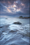 Breaking over Bamburgh