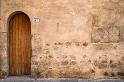 71 - Old door on the streets of Cefalu, Sicily, Italy.