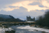 Beautiful sky behind a snowy Kilchurn Castle
