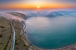 z4370 Rolling Fog at Sunset over Alum Bay