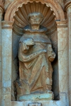 Façade, first tier top sculpture niche right, St. Raymond of Penafort
