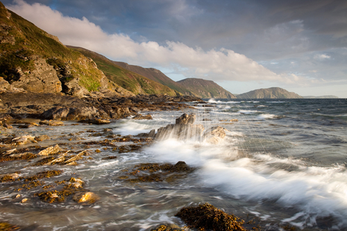 A breezy August evening at White Beach looking south down the stunning South West coastline of the Isle of Man.
