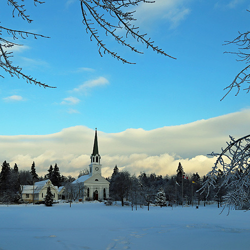 The icy surface reflects the sky's vivid blue hues on Christmas Day.
