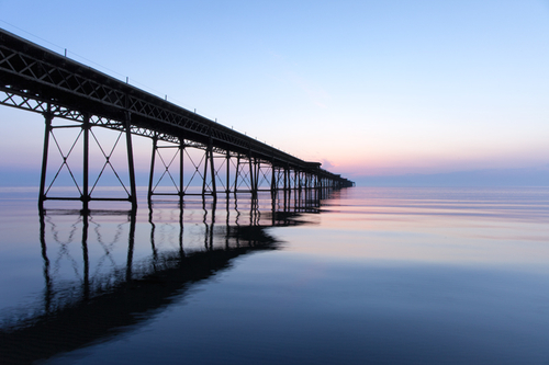 Queen's Pier, Ramsey, on soft and calm spring morning.
