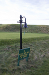Prestwick bell beside 17th green