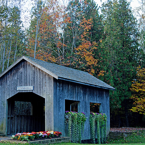 This replica of the old Model Farm Road Covered Bridge was erected in 1994.