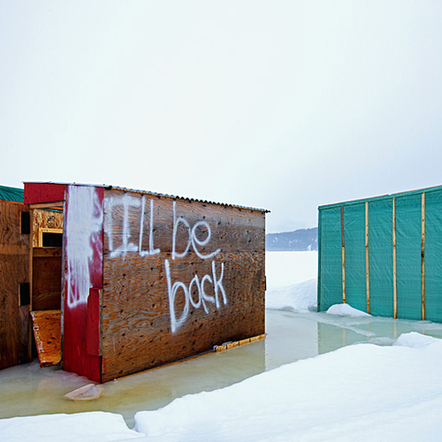 Graffiti on a late season ice shack.