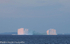 First light on iceberg approaching Disko bay
