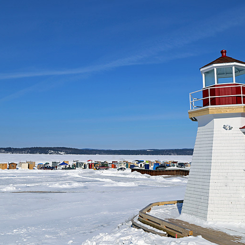 The Renforth Faux Lighthouse and ice fishing huts located at Renforth wharf in Rothesay, New Brunswick.