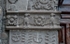 El Cristo Rey, façade, main portal, left pilaster impost