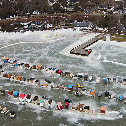 An aerial view of the Renforth ice huts and looking back towards the lighthouse, wharf and boat club.
