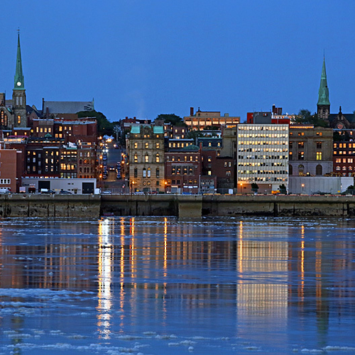 Saint John Harbor reflecting the buildings of Uptown Saint John, New Brunswick, Canada.