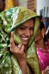 Deogarh, Rajasthan - bride being fitted for her wedding sari