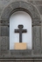 Porciúncula portal, second story niche cross