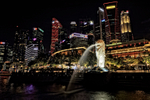 Illuminated Merlion and Singapore Skyline