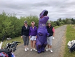 Who's in the dinosaur suit?