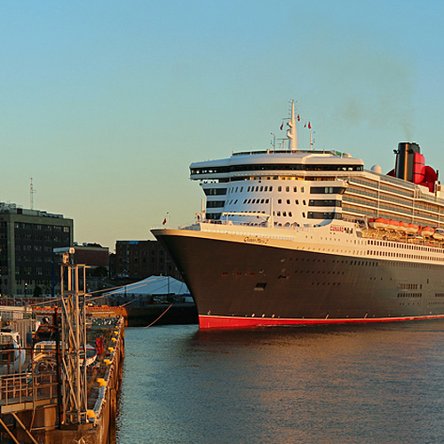 The waterfront @ Saint John, New Brunswick with the Queen Mary 2 cruise ship docked and the Canadian Coast Guard ligh…