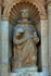 Façade, first tier top sculpture niche right, St. Raymond of Penafort
