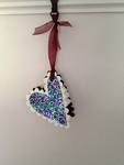 A tiny hanging book Love Token.