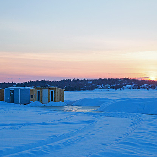 Snowshoeing enthusiasts return from a day of winter activity along the Kennebecasis at Renforth, New Brunswick, Canada.