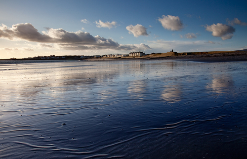 A breezy and cool February afternoon at Castletown. The sea front framed by the clouds and their reflection.