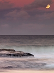 Moonrise at sunset