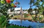 View across Dawlish Brook towards the church