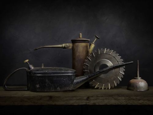 The Cutter and the Cans. Light-painted still-life, featuring a cutting disk and some vintage oil cans. Lit with diffu…