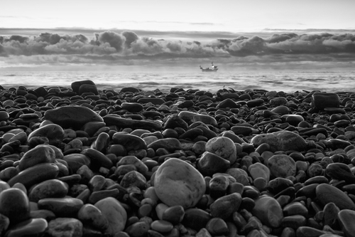 The little fishing boat on a early morning outing to check the lobster pots.