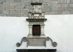 San Pedro, façade, choir loft window & reliefs