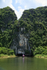 Boat entering Tam Coc cave, Ninh Binh, Vietnam