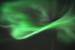 Aurora Borealis in massive green swirling phase