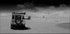 Namibia Walvis Bay desert Living Desert dunes and vehicles bw
