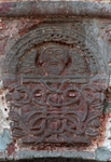 Santo Tomás, façade portal, archivolt keystone
