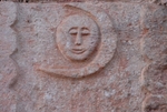 San Francisco de Asís, façade portal, right pilaster relief, moon
