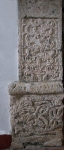 Santa Ana, façade, main portal, left pilaster relief