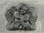 W face relief, cherubim