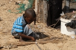 Senegal Fulani Senegal village boy making basket