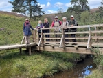 046 The group pause at our fellow walkers memorial Bridge