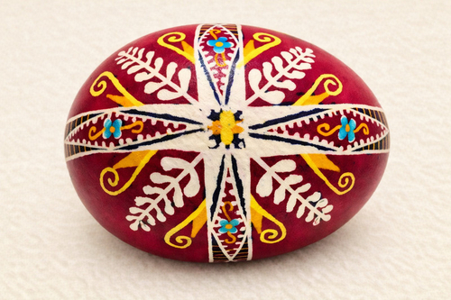 The artist paints with precision and distinction. Many long hours are spent on each egg that the artist paints.  Phot…