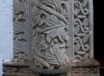 Façade portal, left pilaster relief